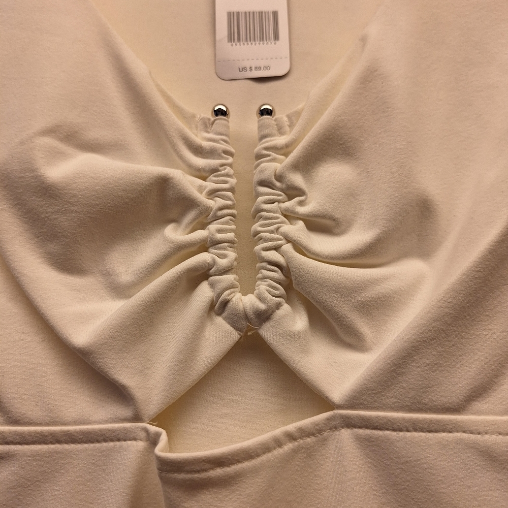 Brand new White U shape keyhole long sleeve top